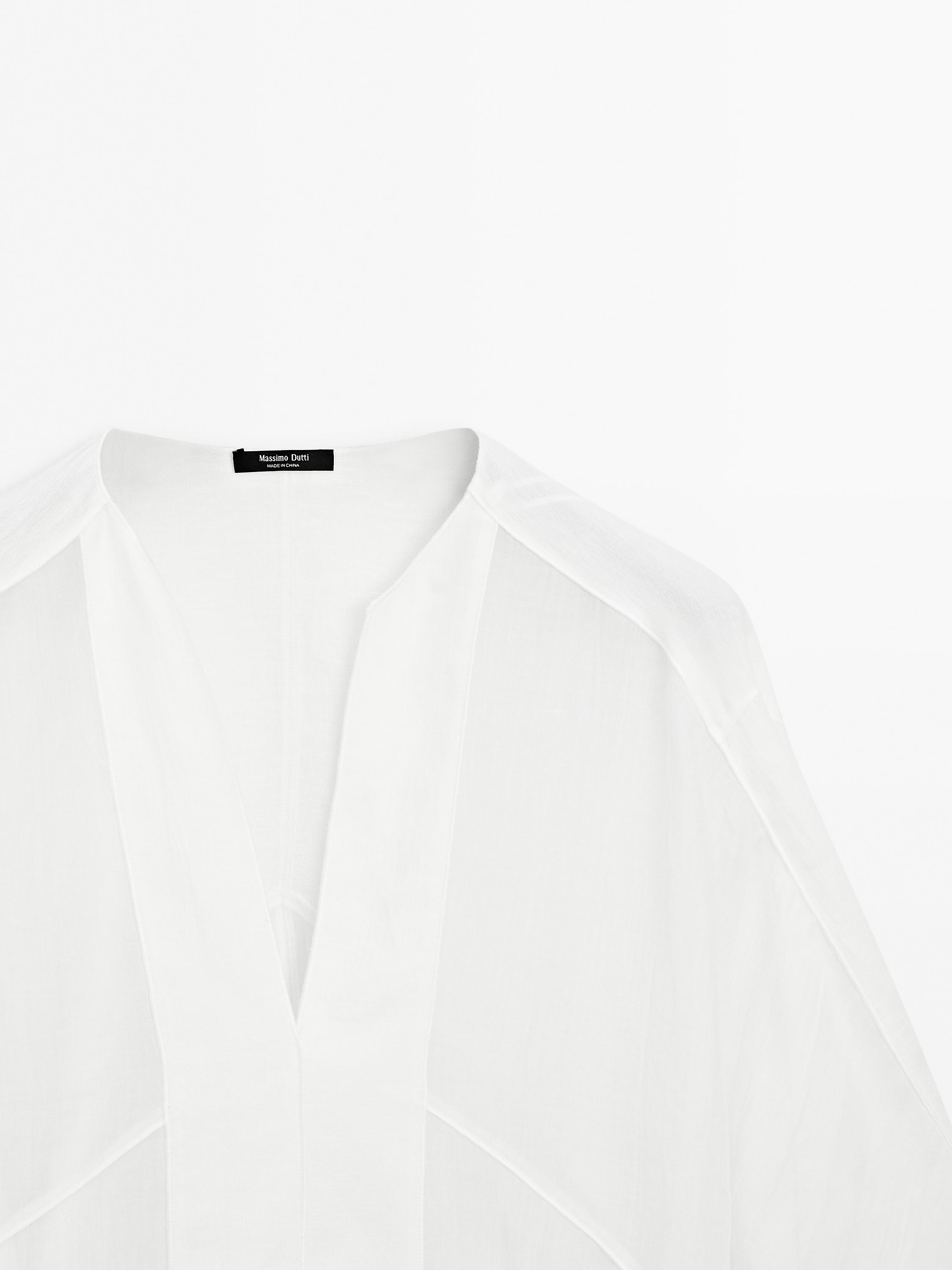 Flowing linen blend blouse with seam details